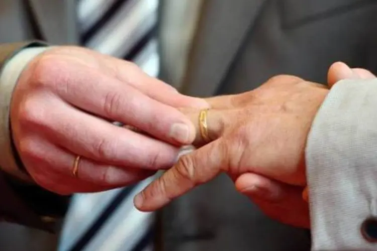 
	Casamento gay: casais expressaram satisfa&ccedil;&atilde;o por agora conseguirem ter &quot;qualidade&quot; e &quot;estabilidade&quot;
 (Denis Charlet/AFP)