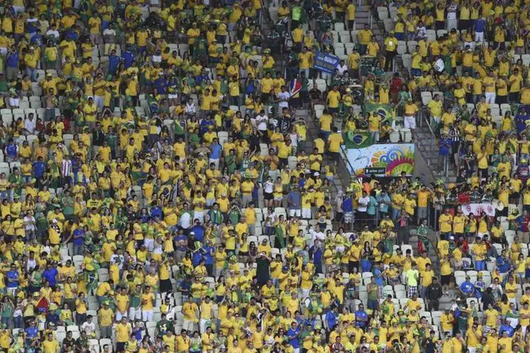 
	Torcedores na partida Brasil X M&eacute;xico: fora o futebol, Brasil est&aacute; se saindo bem at&eacute; agora
 (REUTERS/Francois Xavier Mari)