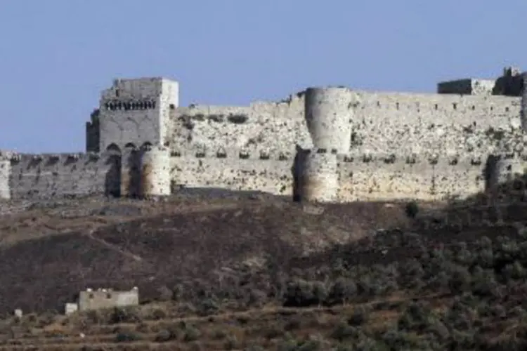 Vista do castelo Krak dos Cavaleiros, na Síria, localizada perto do Líbano: fortaleza era usada como reduto dos rebeldes (Louai Beshara/AFP)
