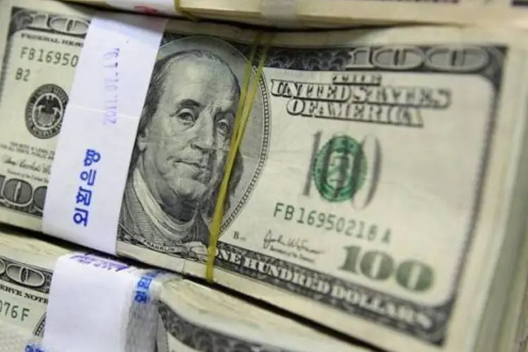 No mercado doméstico, o dólar abriu em alta de 0,16%, a R$ 1,8410 (Jo Yong hak/Reuters)