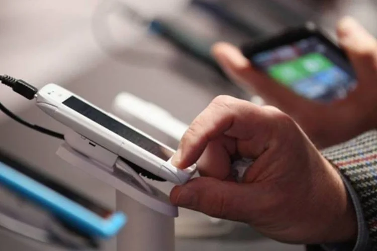 
	Celulares: Advent comprou a fatia detida na companhia pela One Equity Partners, fundo do JP Morgan, e de outros minorit&aacute;rios
 (Getty Images)