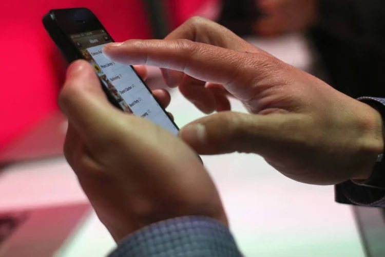 
	Loja da T-Mobile: &quot;n&atilde;o &eacute; uma quest&atilde;o de se (haver&aacute; consolida&ccedil;&atilde;o), mas de quando&quot;, disse Braxton Carter
 (John Moore / Getty Images)