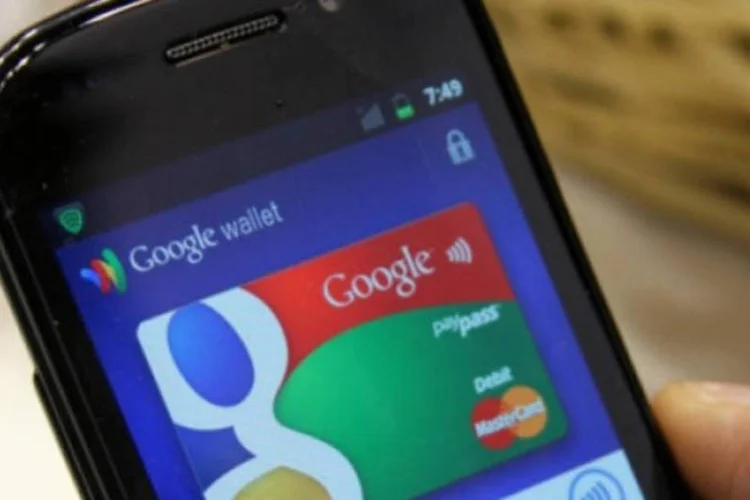 
	Celular com app Wallet, do Google: ju&iacute;za disse que o Google elevou o risco de roubo de identidade
 (Flickr.com/feuilllu)