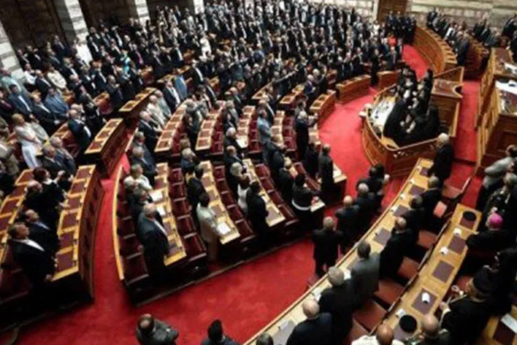 
	Parlamento grego: a vota&ccedil;&atilde;o do segundo pacote de reformas s&oacute; deve ocorrer madrugada de quinta-feira, de acordo com as previs&otilde;es
 (Aris Messinis/AFP)
