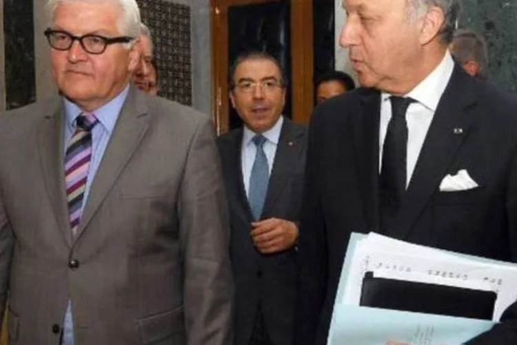 Chanceles da Alemanha, Frank-Walter Steinmeier, e da França, Laurent Fabius: "Não nos resta muito tempo para acabar com esta bagunça", disse chefe da diplomacia alemã (AFP)