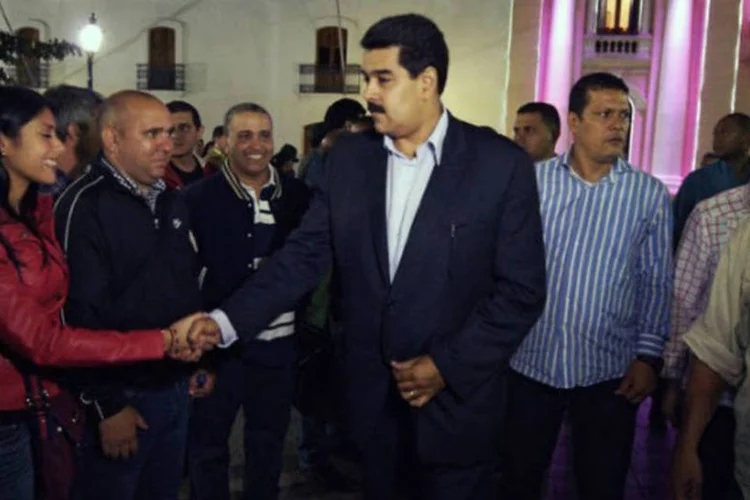 
	Nicol&aacute;s Maduro: o vice-presidente venezuelano informou que a cirurgia de Ch&aacute;vez foi uma opera&ccedil;&atilde;o &quot;delicada, o que nos diz que o processo p&oacute;s-operat&oacute;rio tamb&eacute;m ser&aacute; complexo&quot;
 (AFP/Juan Barreto)