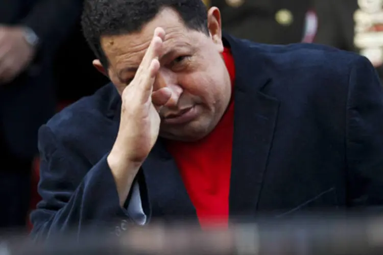 
	Ch&aacute;vez: o presidente venezuelano falou no s&aacute;bado passado pela primeira vez sobre o risco de morte e outras complica&ccedil;&otilde;es que lhe impe&ccedil;am de exercer a Presid&ecirc;ncia
 (Carlos Garcia Rawlins/Reuters)