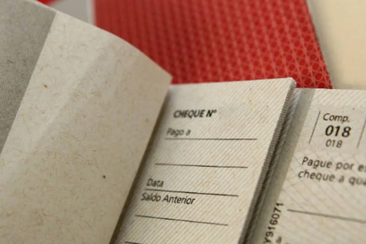 
	Tal&atilde;o de cheques: aumento foi um &quot;reflexo da dificuldade do consumidor em honrar compromissos financeiros t&iacute;picos deste per&iacute;odo num ambiente de taxas de juros cada vez mais altas&quot;
 (Marcos Santos/USP Imagens)
