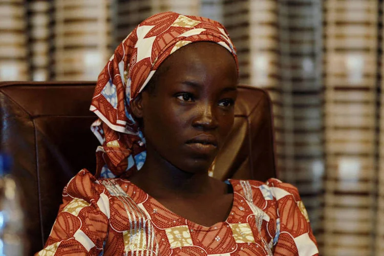 
	Amina Ali Darsha Nkeki: a primeira menina a ser resgatada, foi encontrada por soldados trabalhando num grupo paramilitar na ter&ccedil;a-feira
 (Afolabi Sotunde / Reuters)