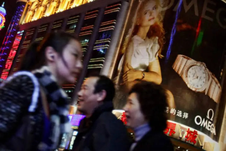 Rua em Xangai: o tradicionalismo não esconde a avidez do consumidor chinês (Feng Li/Getty Images)