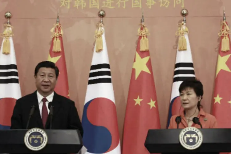 O presidente chinês, Xi Jinping, e a presidente sul-coreana, Park Geun-hye (Ahn Young-joon/Pool/Reuters)