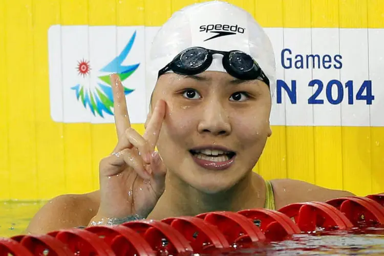 
	Chen Xinyi: a jovem nadadora ficou em quarto lugar, apenas nove cent&eacute;simos do bronze
 (Tim Wimborne / Reuters)