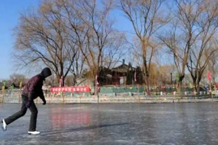 Onda de frio nas províncias centrais e meridiconais da China deixou 58 mil desabrigados (Frederic J. Brown/AFP)