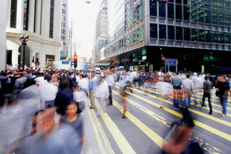 
	Pessoas circulam pelo centro comercial de Hong Kong, na China
 (Medioimages/Photodisc)