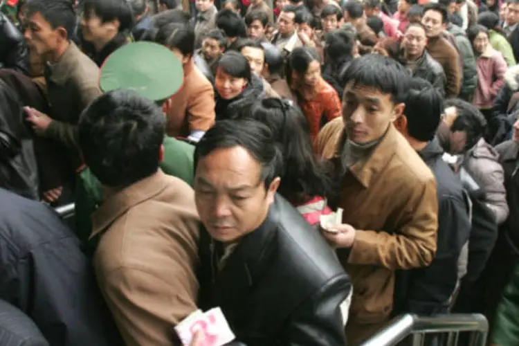 
	Chineses: estrategistas econ&ocirc;micos de Xi poder&atilde;o pela primeira vez colocar as &ldquo;pol&iacute;ticas populacionais&rdquo; &agrave; frente do produto interno bruto
 (China Photos/Getty Images)