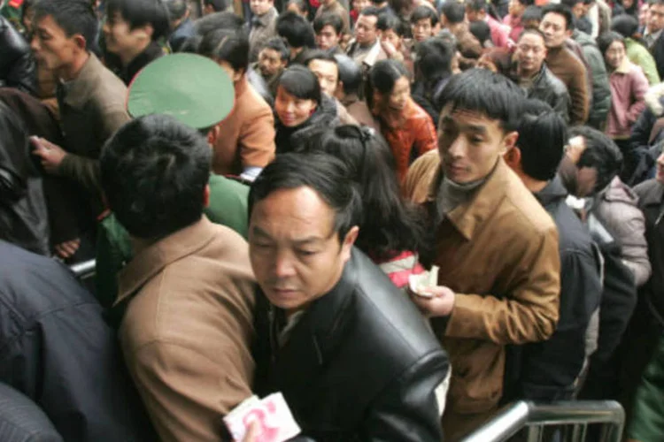 
	Chineses: estrategistas econ&ocirc;micos de Xi poder&atilde;o pela primeira vez colocar as &ldquo;pol&iacute;ticas populacionais&rdquo; &agrave; frente do produto interno bruto
 (China Photos/Getty Images)