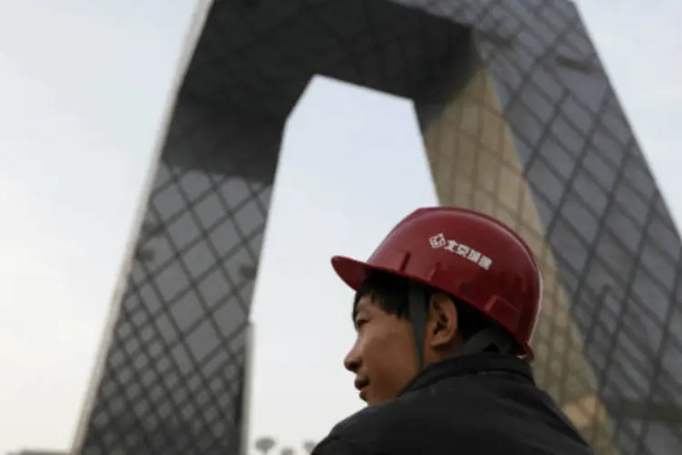 
	China: a economia cresceu apenas 7,8% no ano passado, acima da meta oficial de 7,5%, mas bem abaixo da m&eacute;dia de 10,5% da d&eacute;cada passada e do pico de 14,2% registrado em 2007
 (REUTERS/Jason Lee)