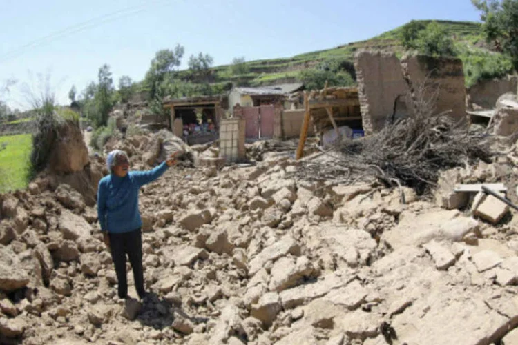 
	Casas destru&iacute;das por terremoto na China: segundo as previs&otilde;es meteorol&oacute;gicas, ir&atilde;o ocorrer fortes chuvas na regi&atilde;o nas pr&oacute;ximas horas
 (Reuters)