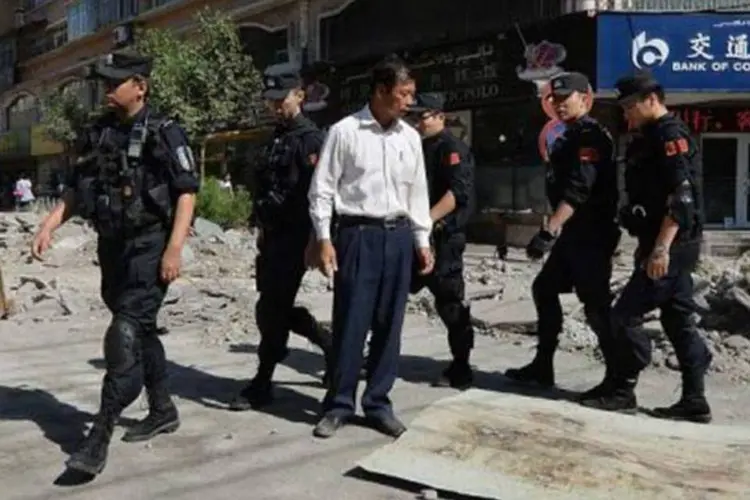 Mais de 100 pessoas, chamadas de "terroristas" pelo governo da China, atacaram na sexta-feira moradores da região de Xinjiang (©afp.com / Mark Ralston)