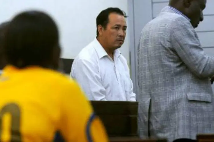 O chinês Tang Yong Jian, acusado de traficar marfim: caso não pague a multa, chinês ficará sete anos na prisão (Tony Karumba/AFP)