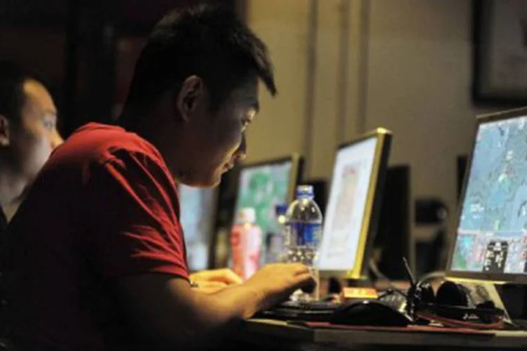 
	As novas regras, anunciadas pela ag&ecirc;ncia de not&iacute;cias oficial Xinhua, tamb&eacute;m exigem que os usu&aacute;rios de internet se registrem com seus nomes verdadeiros
 (Gou Yige/AFP)