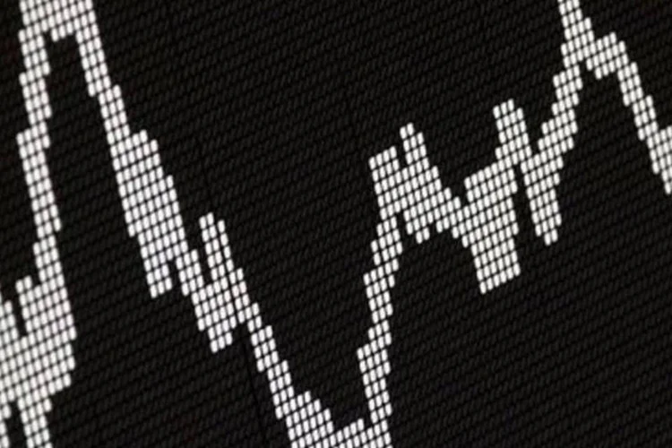 
	O principal indicador da Bolsa de Valores de Santiago, o IPSA, encerrou com desvaloriza&ccedil;&atilde;o de 0,89%, aos 3.831,92 pontos
 (Frank Rumpenhorst/AFP)