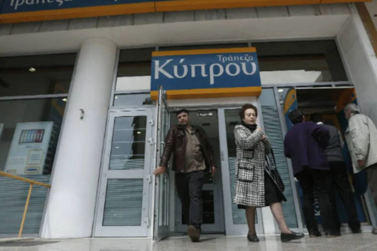 
	Ag&ecirc;ncia do Banco do Chipre em Atenas: cipriotas n&atilde;o foram t&atilde;o fortemente afetados como era esperado
 (REUTERS/John Kolesidis)