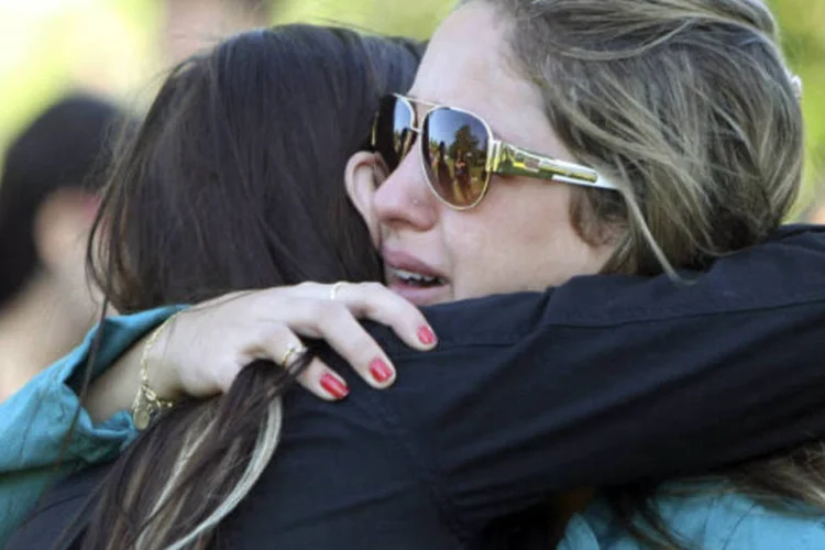 
	Parente de v&iacute;tima do inc&ecirc;ndio na boate Kiss: &ldquo;&Eacute; uma manifesta&ccedil;&atilde;o silenciosa, de dor, solidariedade e tamb&eacute;m de indigna&ccedil;&atilde;o&quot;, disse&nbsp;Carmen.
 (REUTERS/Edison Vara)