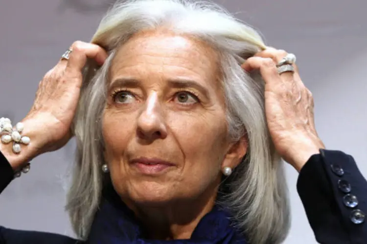 
	Christine Lagarde: diretora-gerente do FMI &nbsp;alertou para vulnerabilidades nos mercados emergentes
 (SeongJoon Cho/Bloomberg)