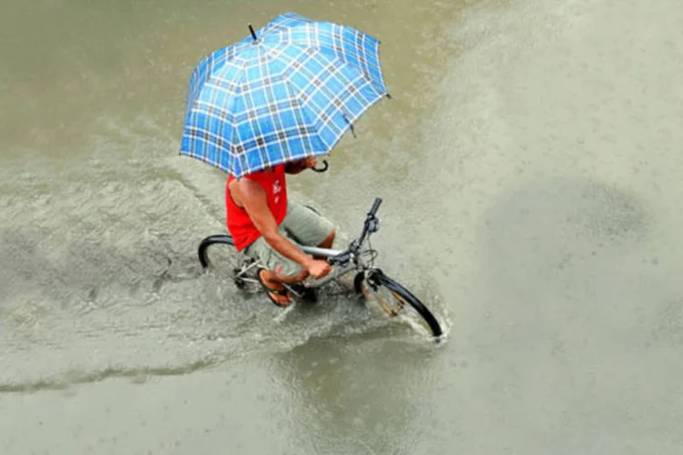 
	Chuva em S&atilde;o Paulo: uma das principais conclus&otilde;es do relat&oacute;rio &eacute; o aumento na frequ&ecirc;ncia de eventos clim&aacute;ticos extremos
 (Agliberto Lima/ Veja São Paulo)