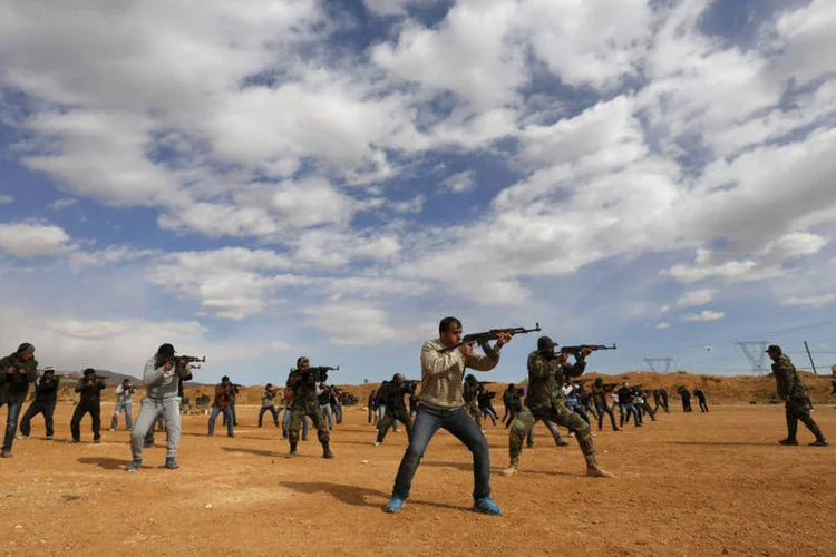
	Ex&eacute;rcito s&iacute;rio: situada a 800 metros acima do n&iacute;vel do mar, no Monte Akrad, a cidade caiu nas m&atilde;os dos rebeldes em julho de 2012
 (Omar Sanadiki / Reuters)