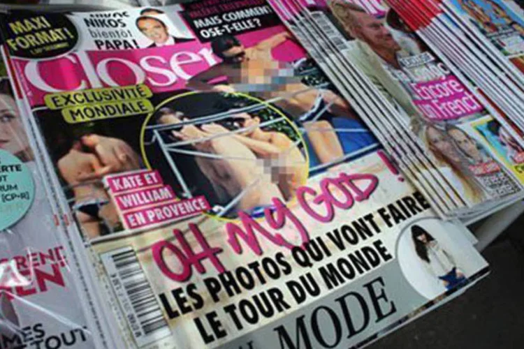 
	Revista Closer exibe fotos de Catherine de topless: o casal entrou com uma a&ccedil;&atilde;o contra a editora Mondadori por &quot;ataques &agrave; vida privada&quot;
 (Thomas Samson/AFP)