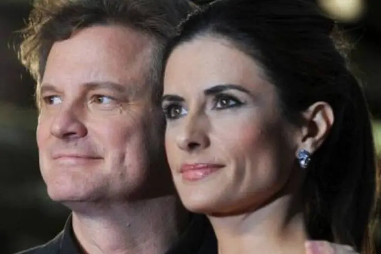 Firth e sua esposa, a italiana Livia Giuggioli (Ben Stansall/AFP)