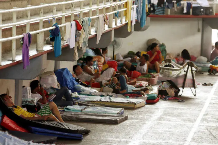 
	Colombianos que foram deportados da Venezuela em um albergue tempor&aacute;rio em C&uacute;cuta
 (REUTERS/Jose Miguel Gomez)