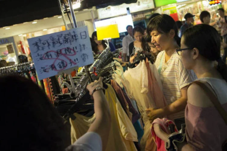 
	A Federa&ccedil;&atilde;o Chinesa de Log&iacute;stica e Compras informou que o &iacute;ndice oficial de atividade dos gerente de compras do setor de servi&ccedil;os acelerou em julho para 54,1, de 53,9 em junho
 (Jerome Favre/Bloomberg)