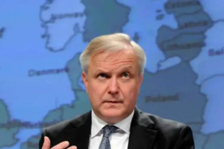O comissário europeu para Assuntos Econômicos e Monetários, Olli Rehn: cerca de 600 milhões de euros serão entregues rapidamente (Thierry Charlier/AFP)