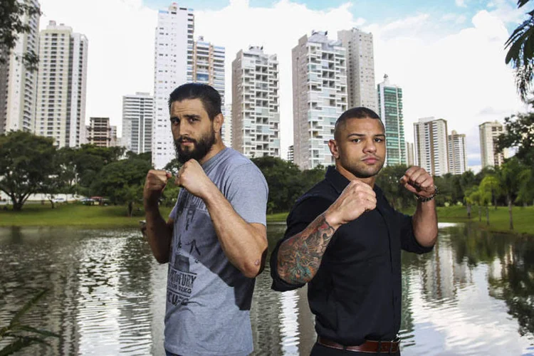 Carlos Condit (esq.) e Thiago Pitbull já tentaram conquistar o cinturão dos meio-médios, mas foram derrotados pelo então campeão Georges St-Pierre. (Wander Roberto / Inovafoto)