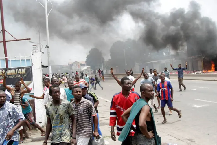Conflito: os protestos para pedir a renúncia do presidente explodiram em setembro na capital Kinshasa, onde mais de 50 pessoas morreram (Kenny Katombe / Reuters)