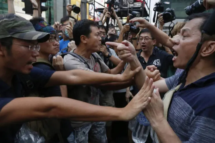 
	Confrontos em Hong Kong: organiza&ccedil;&otilde;es disseram que n&atilde;o v&atilde;o desocupar as ruas
 (Bobby Yip/Reuters)