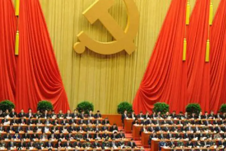 
	&Eacute; esperado que Xi Jinping seja o primeiro da fila durante marcha, o que indicaria ser ele o novo l&iacute;der do partido
 (Goh Chai Hin/AFP)