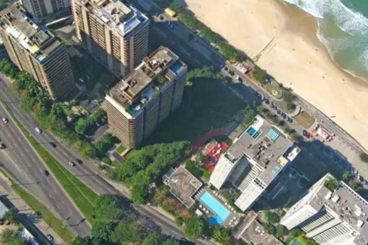 
	Vista A&eacute;rea de pr&eacute;dios em S&atilde;o Conrado, Rio de Janeiro: expectativa &eacute; que o pre&ccedil;o dos alugueis baixe um pouco mais na semana anterior ao torneio
 (Creative Commons / Flickr / herval)