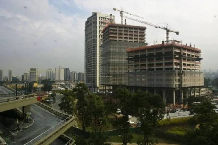 
	Constru&ccedil;&otilde;es nem S&atilde;o Paulo: registros de ofertas de fundos imobili&aacute;rios atingiram R$ 15,4 bilh&otilde;es, mais que o dobro dos R$ 7,6 bilh&otilde;es de 2011
 (Mario Rodrigues/Veja São Paulo)