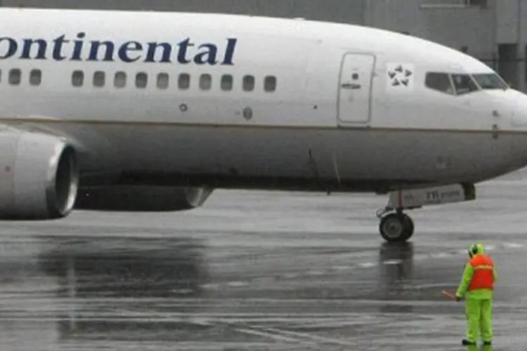 
	United Continental: companhia tem sofrido para consolidar suas opera&ccedil;&otilde;es quase tr&ecirc;s anos ap&oacute;s a fus&atilde;o de 3,17 bilh&otilde;es de d&oacute;lares da UAL e Continental Airlines
 (Justin Sullivan/Getty Images/AFP)