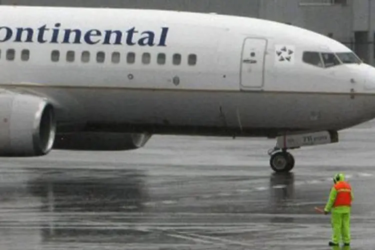 
	United Continental: &Agrave;s 15h05 (de Bras&iacute;lia), a companhia perdia 3,72%
 (Justin Sullivan/Getty Images/AFP)