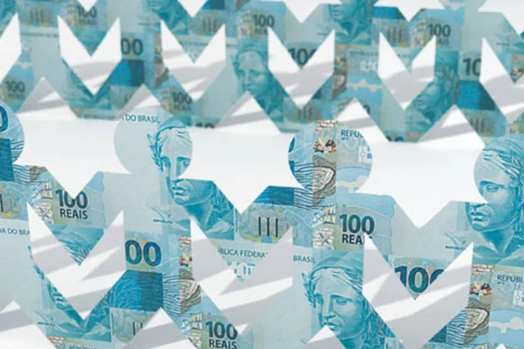 Bonecos de papel feitos com notas de 100 reais (Otavio Silveira / VOCÊ S/A)