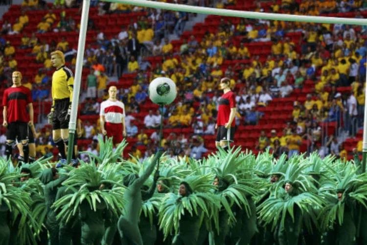 
	Cerim&ocirc;nia de abertura da Copa das Confedera&ccedil;&otilde;es:&nbsp;de acordo com o COL, 5.652 volunt&aacute;rios foram selecionados para trabalhar no evento, dos quais 265 vieram de outros pa&iacute;ses.
 (REUTERS/Kai Pfaffenbach)
