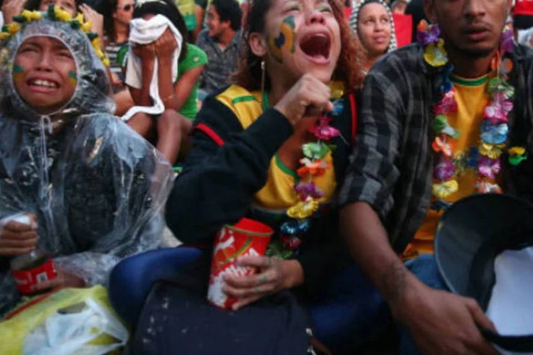 
	Fan Fest: torcedores relataram que houve confus&atilde;o, roubos e arrast&atilde;o durante o jogo
 (Mario Tama/Getty Images)