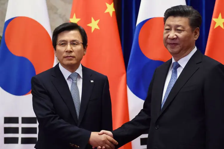 
	Coreia do Sul e China: China e Coreia do Sul, disse Xi, deveriam continuar trabalhando pela desnucleariza&ccedil;&atilde;o da pen&iacute;nsula coreana
 (Greg Baker / Reuters)