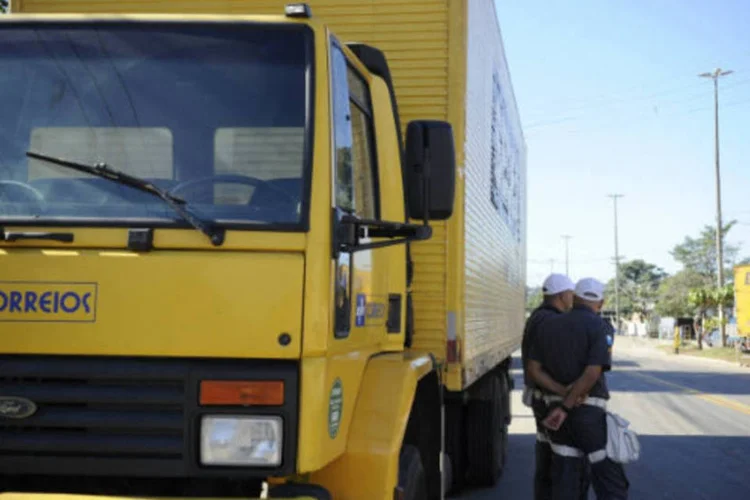 
	Funcion&aacute;rios dos Correios: empresa j&aacute; havia feito toda a opera&ccedil;&atilde;o log&iacute;stica dos Jogos Pan-Americanos de 2007, tamb&eacute;m no Rio
 (Tânia Rêgo/ABr)