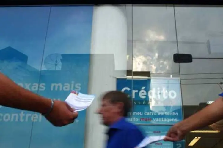 Oferta de crédito pessoal, em uma rua de São Paulo: (ROBERTO SETTON/EXAME)
